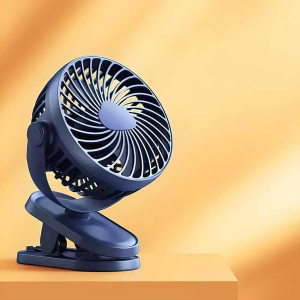 Portable super airflow silent USB desktop fan with 360° rotation and clip-on base.