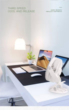 Portable Super Airflow Clip-On Fan on a desk, enhancing comfort with three speed settings for home or office use.